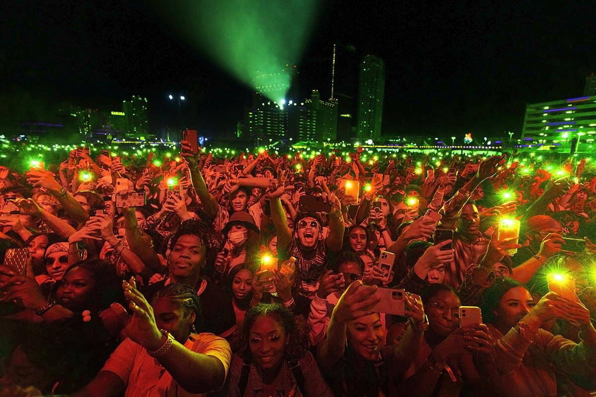 Festival goers dance during a performance at During Day N Vegas at the Las Vegas Festival Groun ...