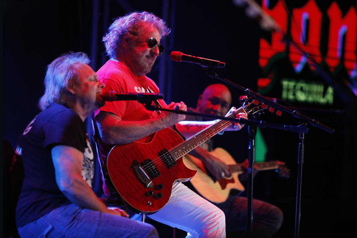 Michael Anthony, left, Sammy Hagar, center, and Vic Johnson, right, perform during Sammy Hagar ...