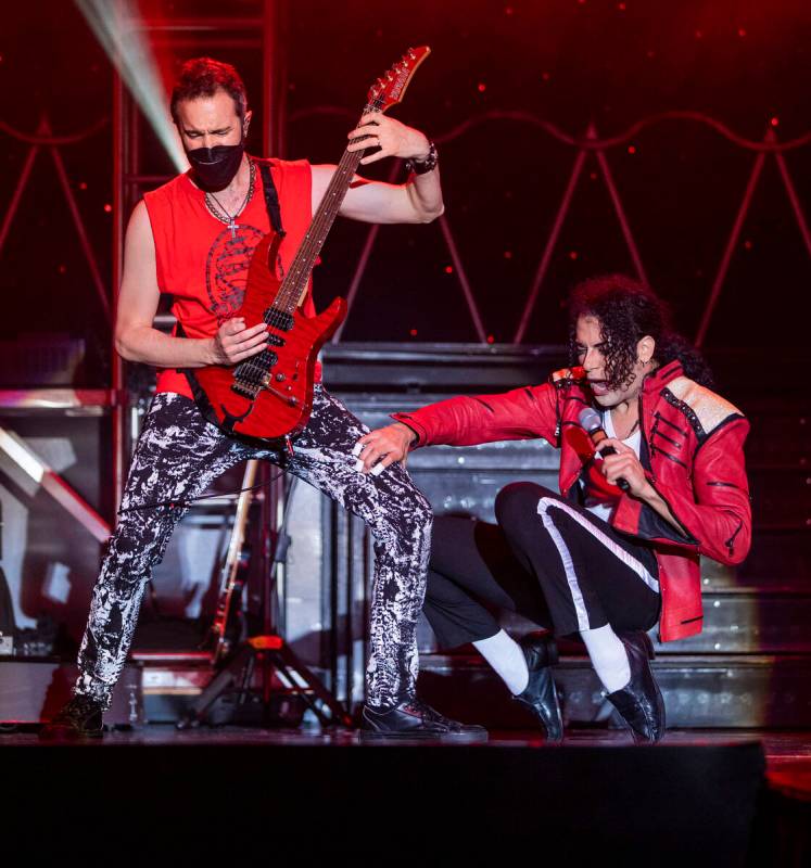 Jalles Franca as Michael Jackson performs alongside a guitarist during the opening performance ...