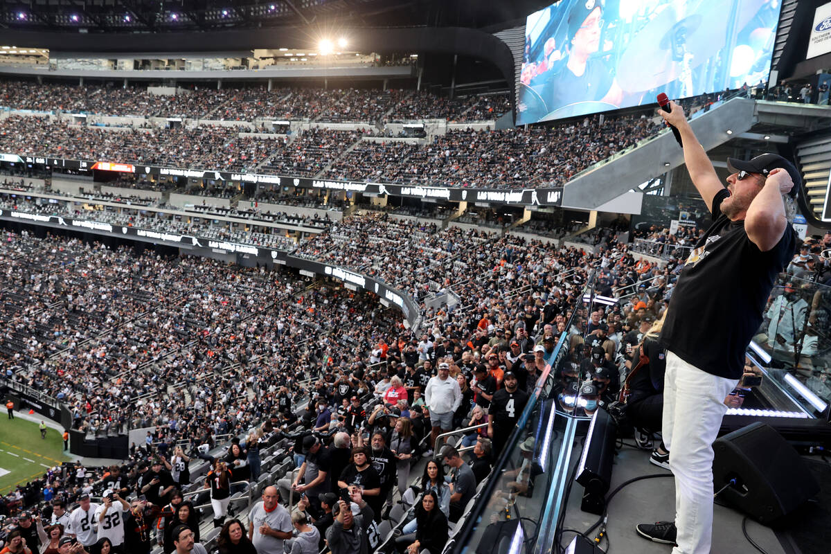 Sammy Hagar performs with David Perrico and the Raiders House Band during halftime as the Raide ...