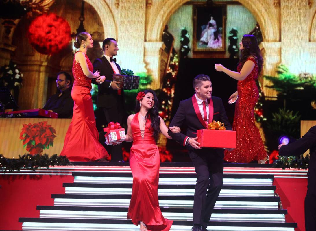 The full cast, including Jasmine Trias and Ben Stone, front, perform "We Need a Little Chr ...