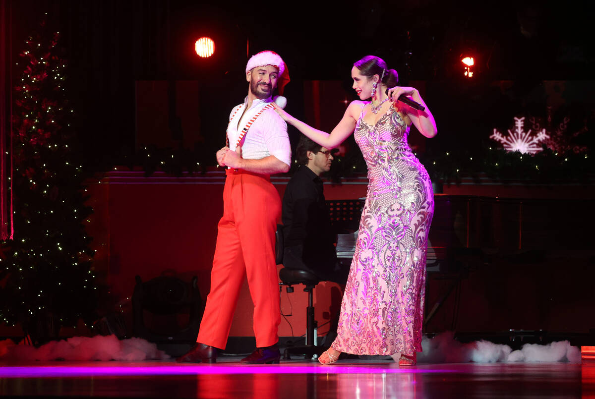 Jaclyn McSpadden sings "Santa Baby" with Alejandro Domingo during a preview of " ...