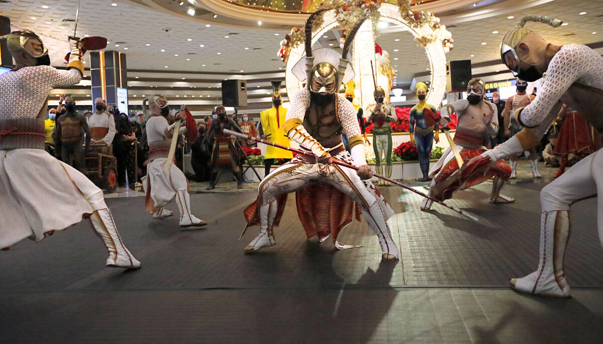Cirque Du Soleil's KÀ artists perform battle scenes during a pop-up performance in the lob ...