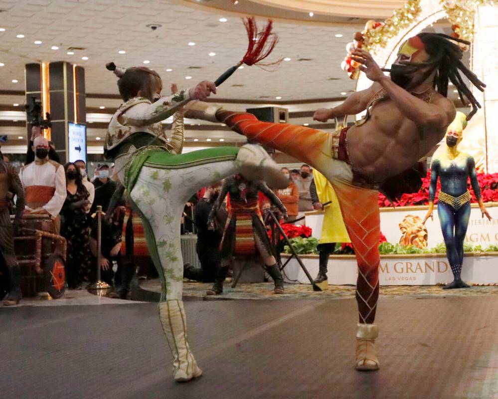 Cirque Du Soleil's KÀ artists perform battle scenes during a pop-up performance in the lobby o ...