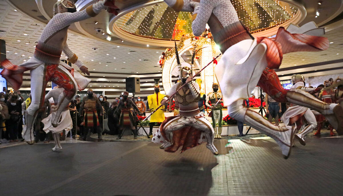 Cirque Du Soleil's KÀ artists perform battle scenes during a pop-up performance in the lob ...