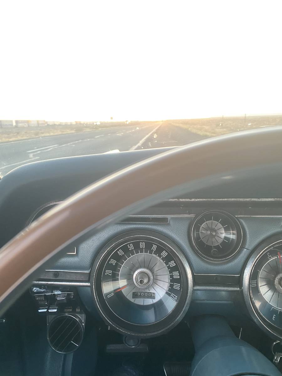 R-J columnist John Katsilometes turns the odometer in his 1967 Mercury Cougar to 173,000 miles ...