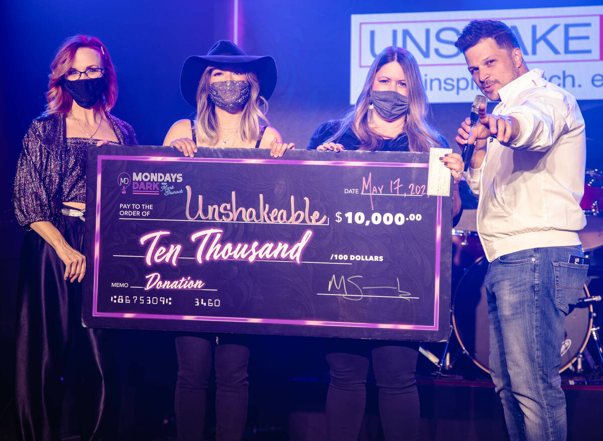 The Space owner Mark Shunock; his wife, Cheryl Daro, second from left; The Space Charity Coordi ...