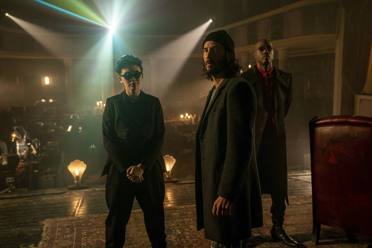 Jessica Henwick as Bugs, Keanu Reaves as Neo/Thomas Anderson and Yahya Abdul-Mateen II as Morph ...