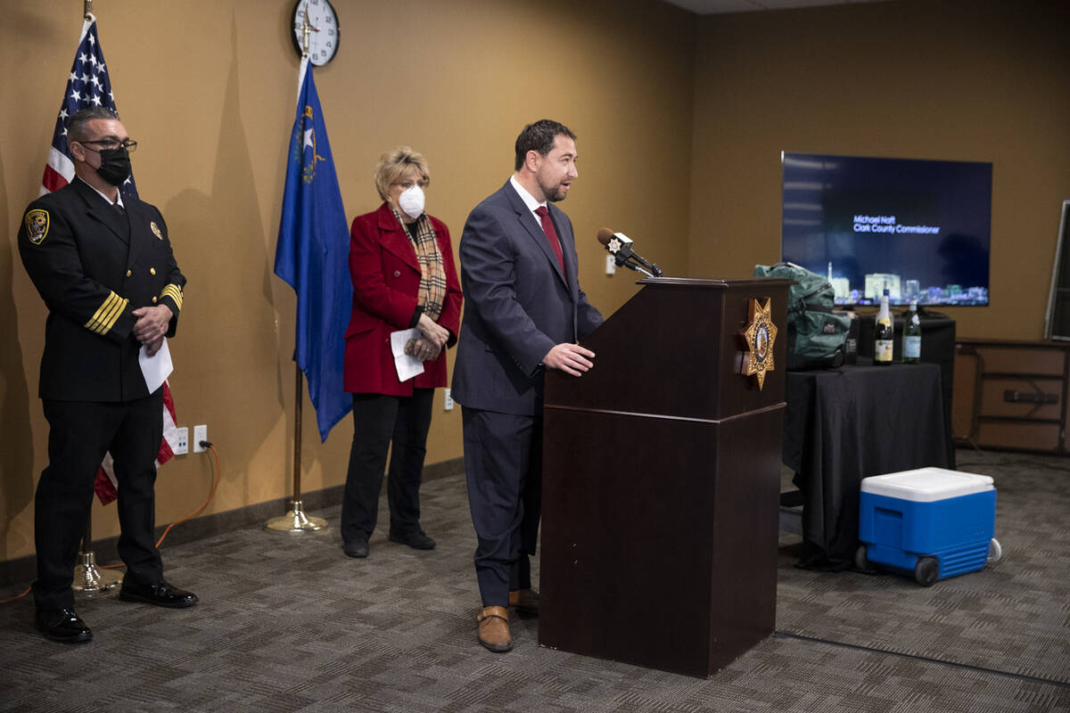 Clark County Commissioner Michael Naft, right, with Clark County Deputy Fire Chief Warren Whitn ...
