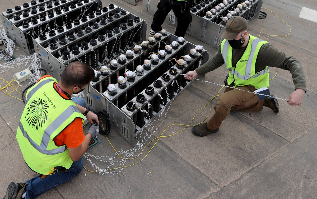 Pyro technicians with Fireworks by Grucci, from left, Justin Presny, Robert Inga, Michael Espos ...