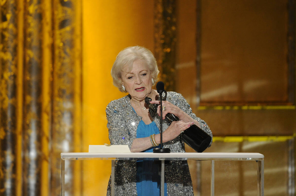 Betty White accepts the award for best female actor in a comedy series for "Hot in Clevela ...