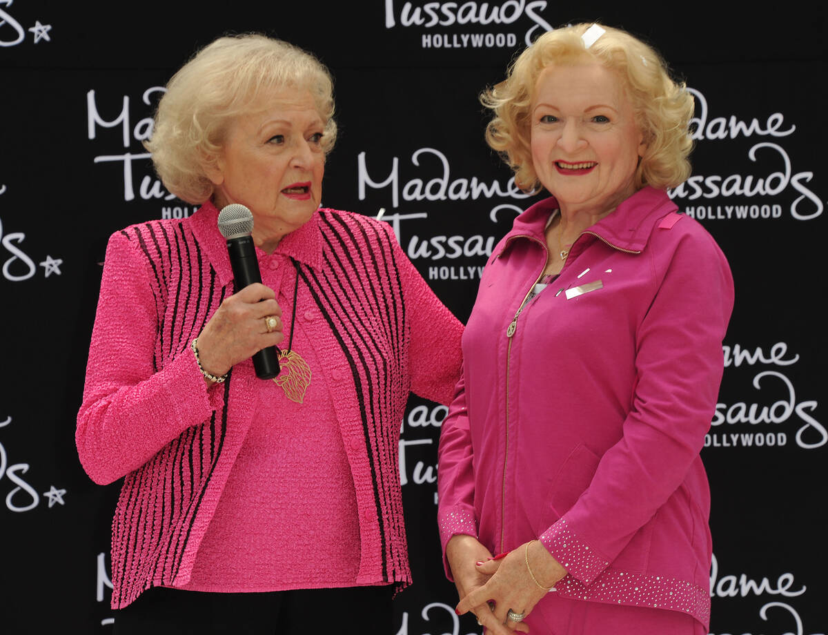 Betty White, at left, attends her wax figure unveiling at Madame Tussauds on Monday, June 4, 20 ...