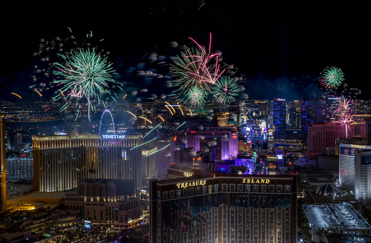 Fireworks explode over the Strip during New Year’s Eve celebrations on Saturday, Jan. 1, ...