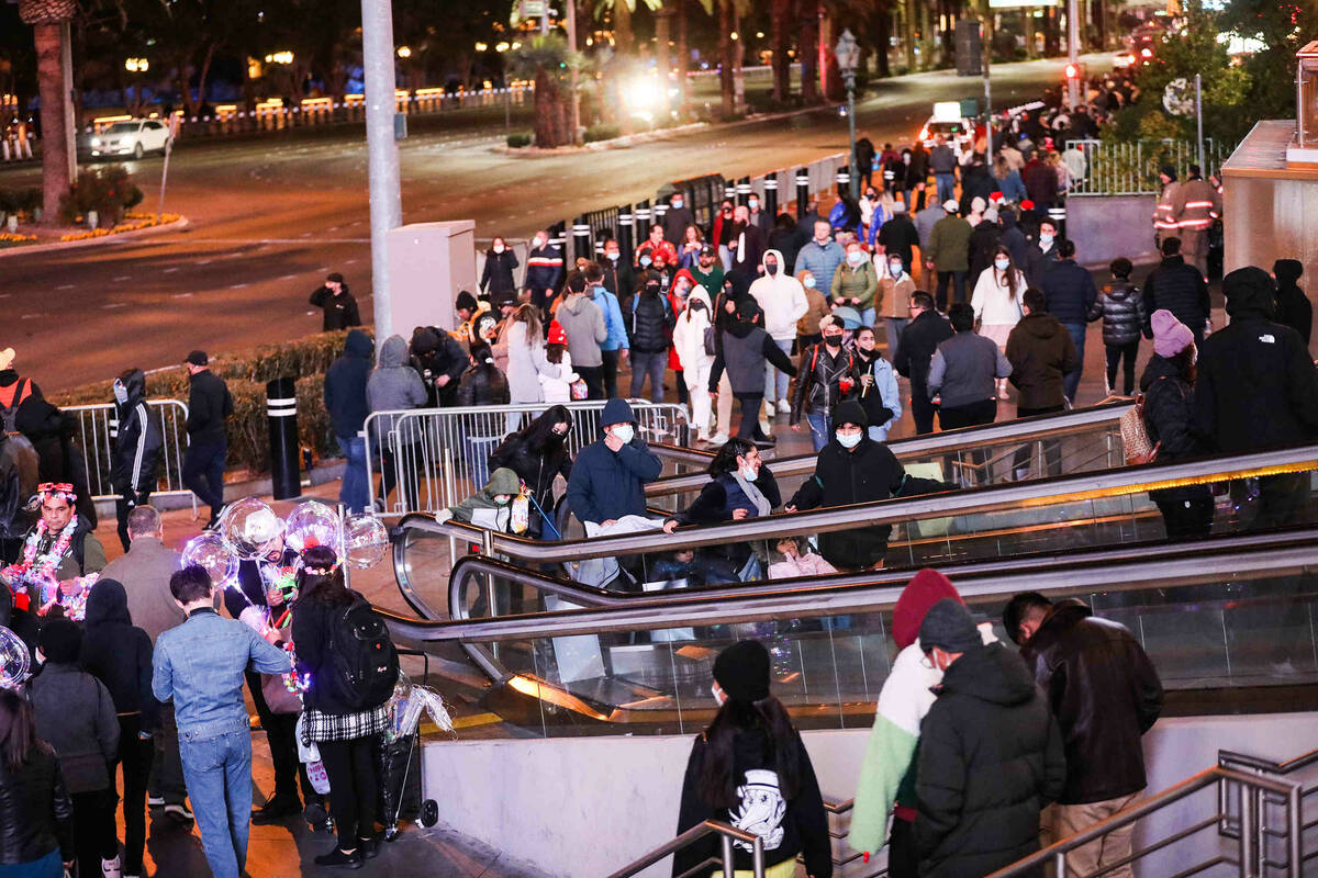 Crowds walk the Strip on Friday, Dec. 31, 2021 in Las Vegas. Rachel Aston/Las Vegas Review-Journal