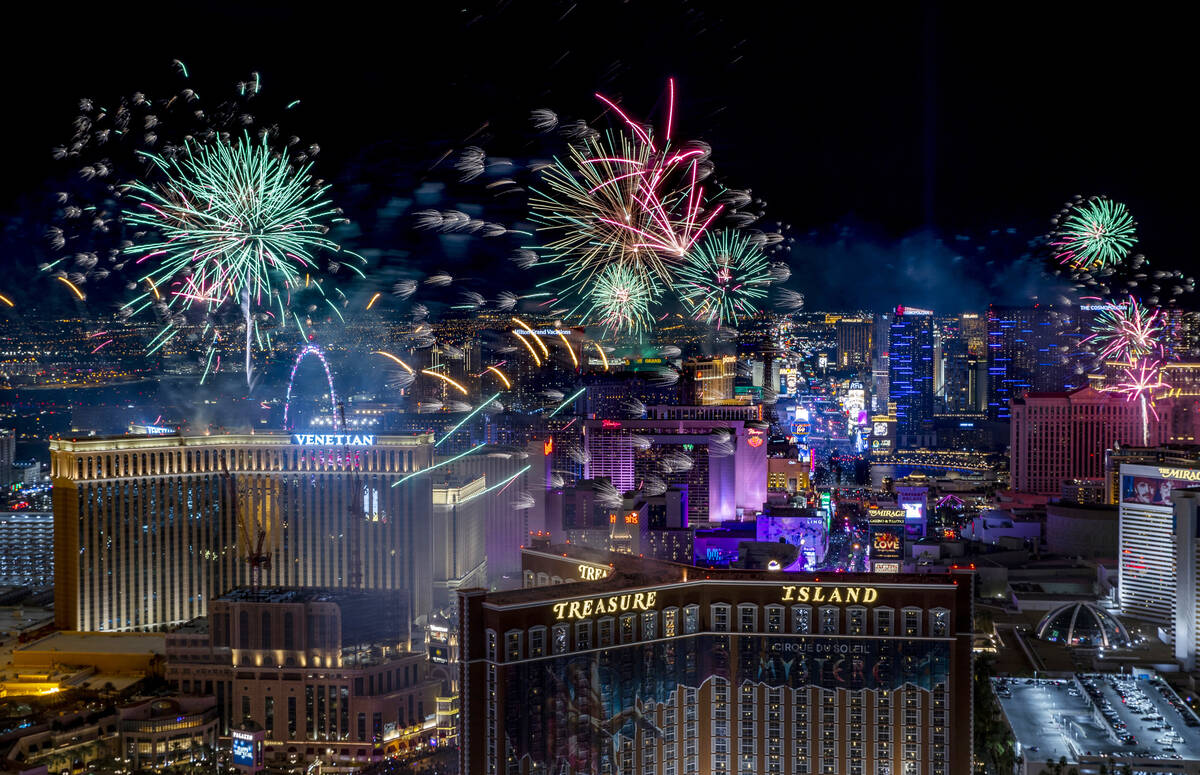 Fireworks explode over the Strip during New Year’s Eve celebrations on Saturday, Jan. 1, ...