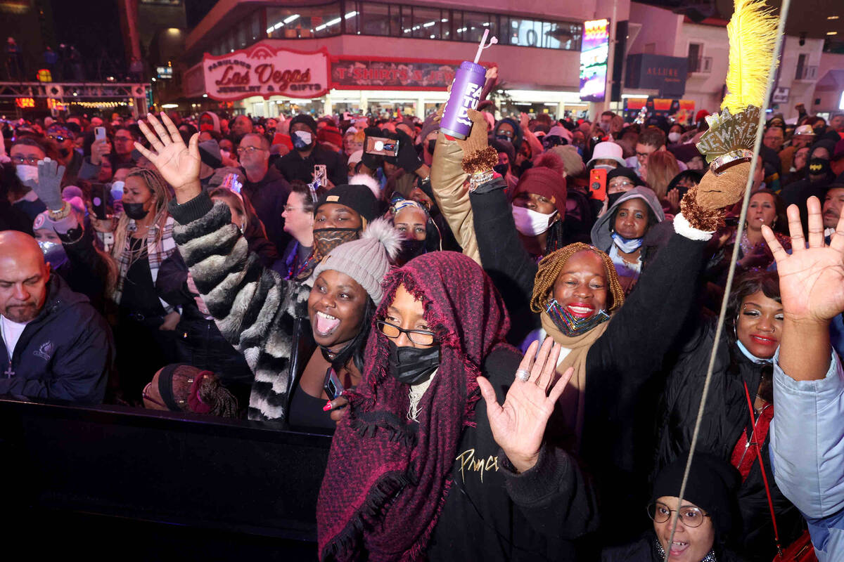 Revelers, including from left, Shanica Jones of Las Vegas, Brenyal Johnson of Long Beach, Calif ...