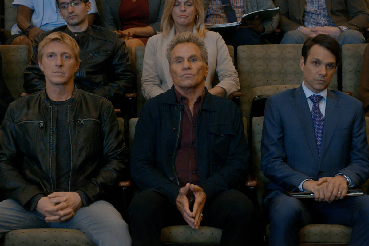 COBRA KAI (L to R) WILLIAM ZABKA as JOHNNY LAWRENCE, MARTIN KOVE as JOHN KREESE, and RALPH MACC ...