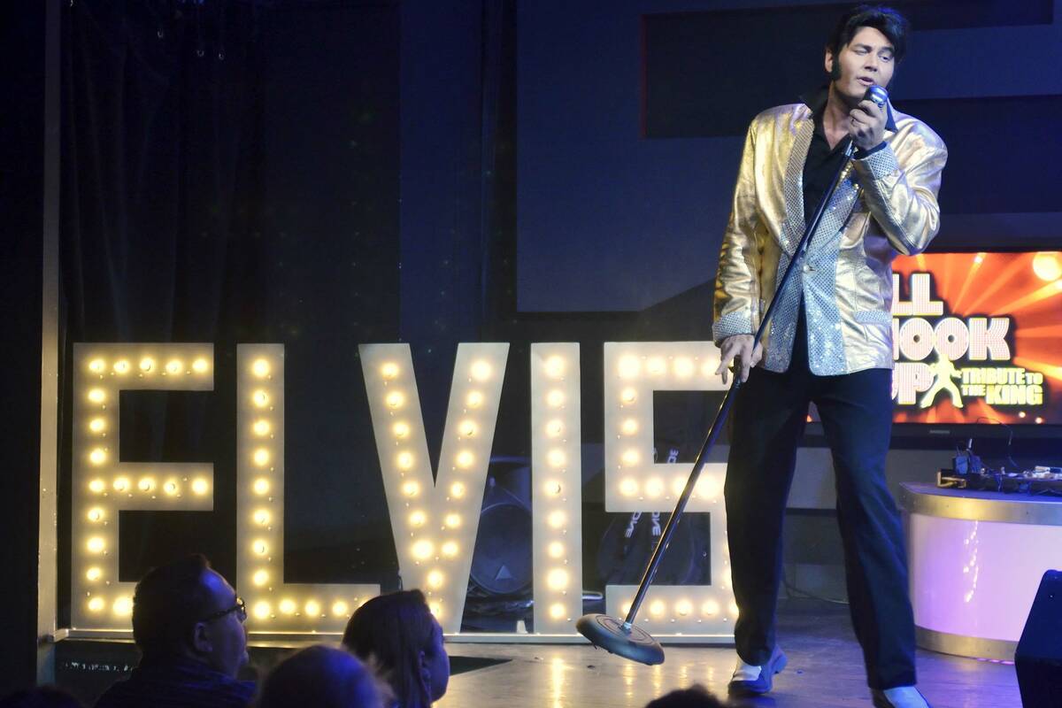 Travis Allen performs as Elvis Presley during "All Shook Up" at the V Theater in the Miracle Mi ...