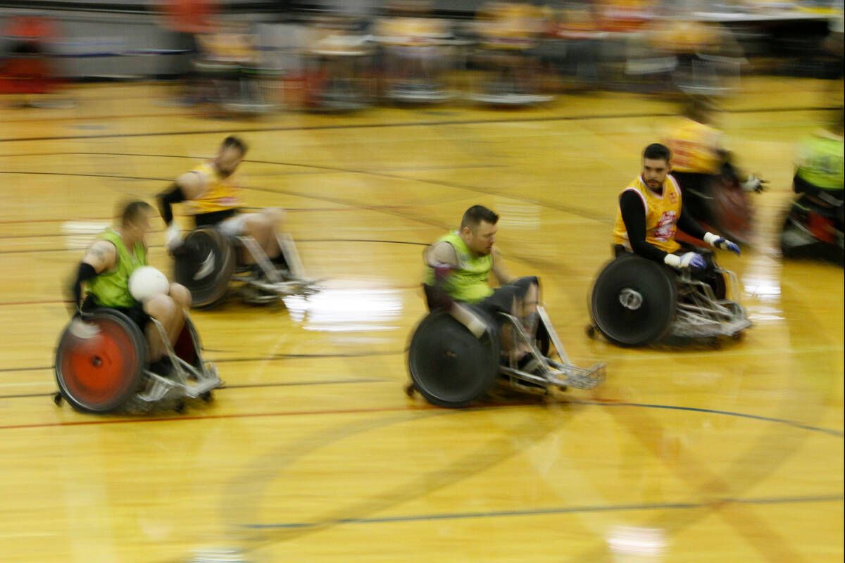 Las Vegas High Rollers and Seattle Slam players play during “Vegas Vengeance” wheelchair ru ...