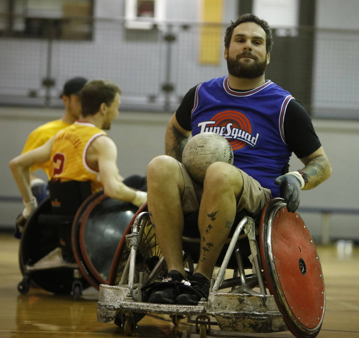 Peter Vinnitsky, High Rollers coach, plays wheelchair rugby at Dula Gym during a demonstration ...