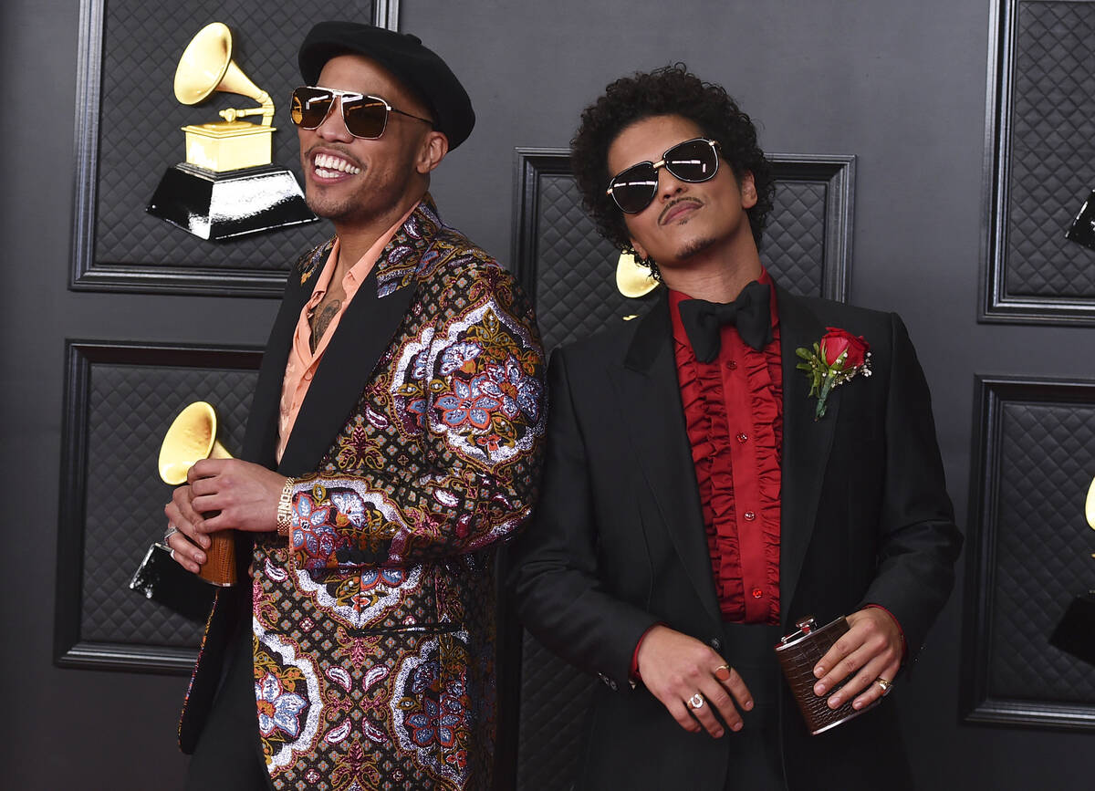 Anderson .Paak, left, and Bruno Mars, of the duo Silk Sonic, appear at the 63rd annual Grammy A ...