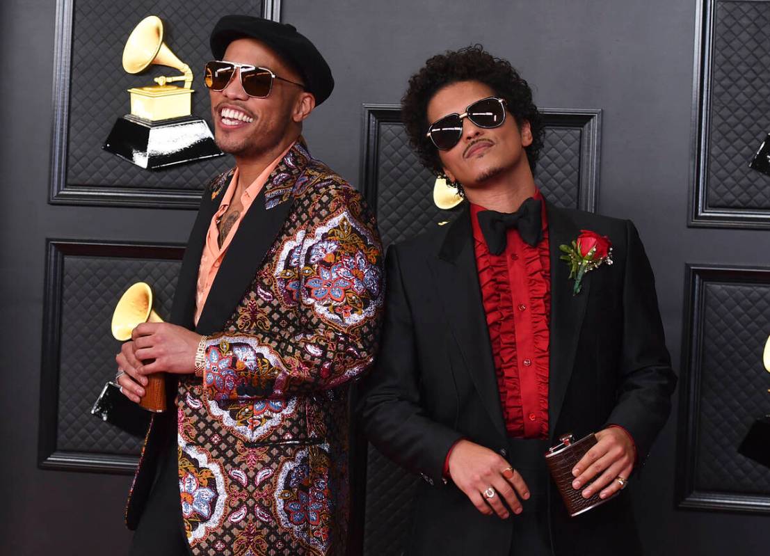 Anderson .Paak, left, and Bruno Mars, of the duo Silk Sonic, appear at the 63rd annual Grammy A ...