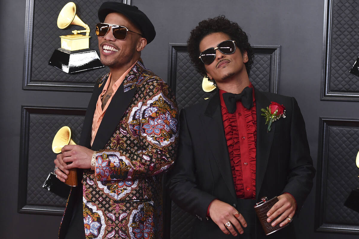 Anderson .Paak, left, and Bruno Mars, of the duo Silk Sonic, appear at the 63rd annual Grammy A ...