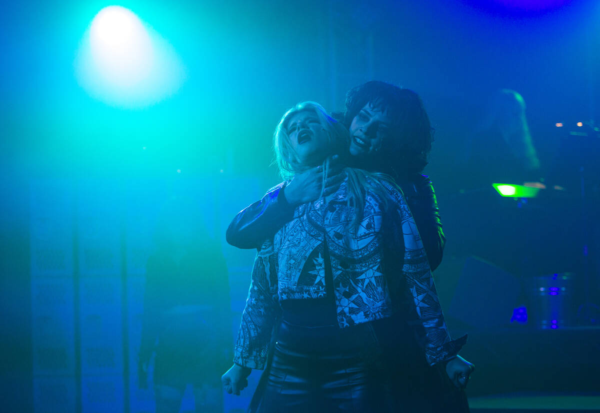 Katie Marie Jones, left, and Caitlin Ary perform during the opening night of “The Craft: ...