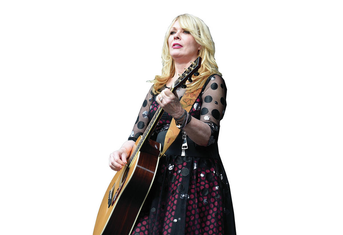 FILE - Nancy Wilson of Heart performs at RFK Stadium in Washington on July 4, 2015. Wilson rele ...