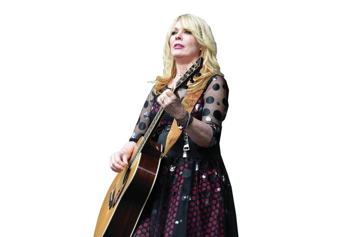FILE - Nancy Wilson of Heart performs at RFK Stadium in Washington on July 4, 2015. Wilson rele ...
