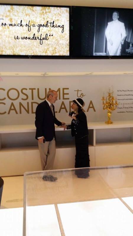 Designer Anna Nateece is shown with Liberace Foundation Chairman Jonathan Warren at an exhibit ...