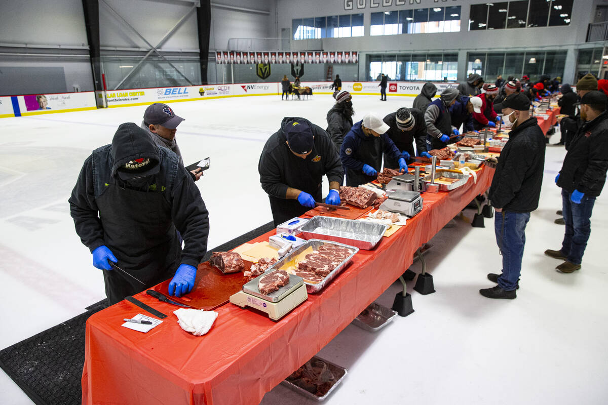 Matt Willis, of Coralville, Iowa, left, and Juan Bedolla, of Corona, Calif., second from left, ...