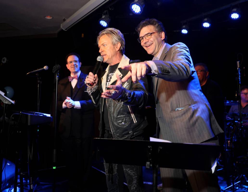 Las Vegas Review-Journal man-about-town columnist John Katsilometes, right, with Chris “ ...
