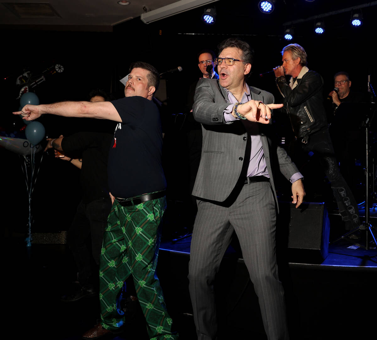 Las Vegas Review-Journal man-about-town columnist John Katsilometes, right, dances with Enoch A ...