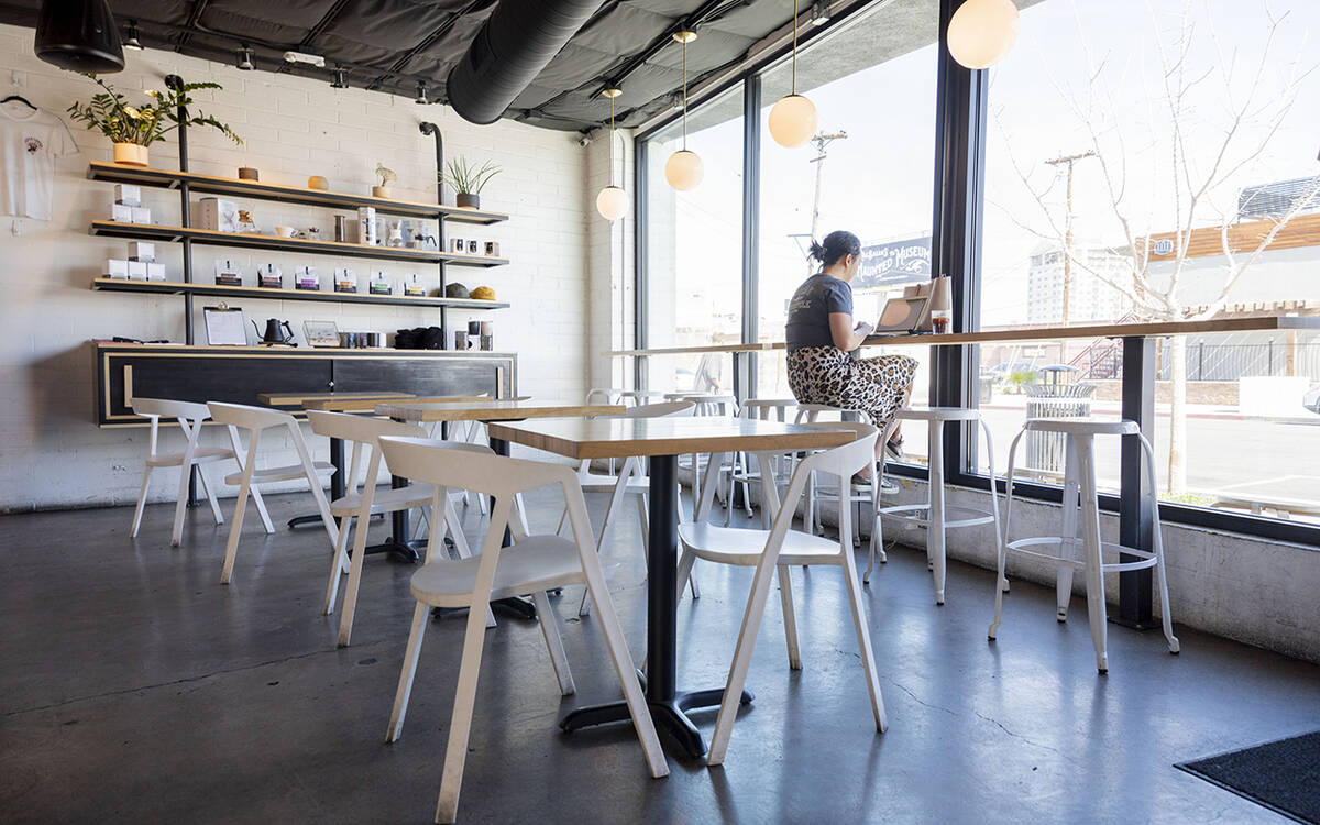 An individual works on their computer at Vesta Coffee Roasters in the Arts District in Las Vega ...