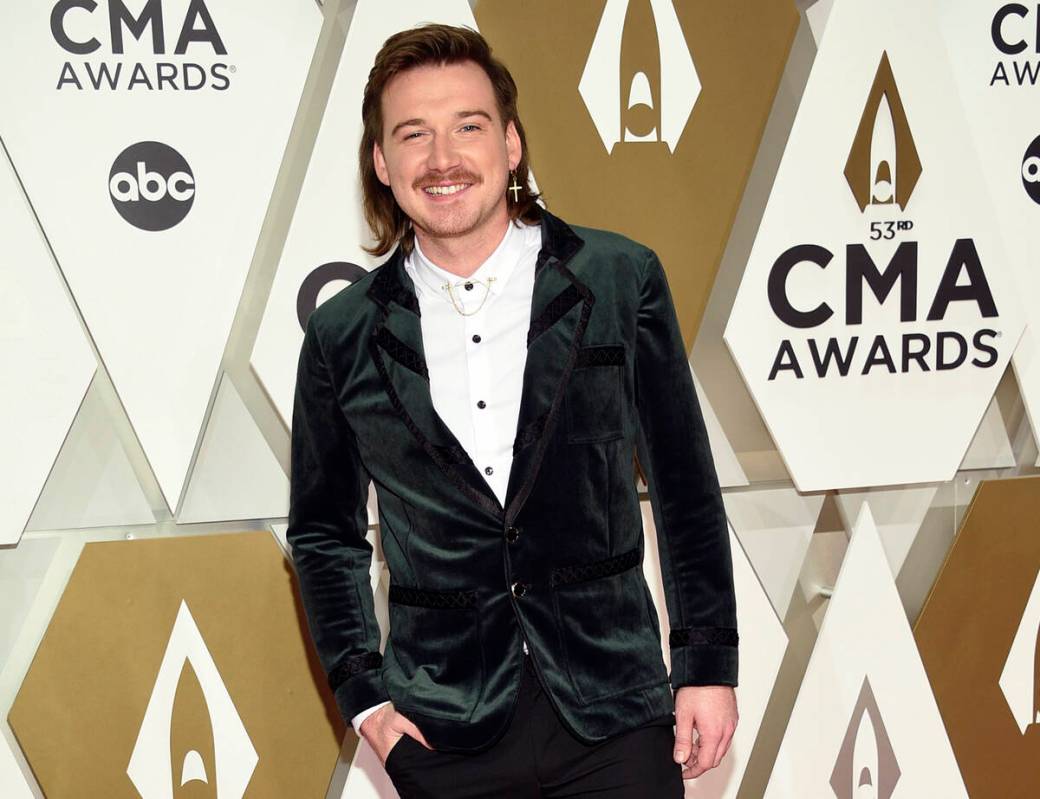 FILE - Morgan Wallen arrives at the 53rd annual CMA Awards on Nov. 13, 2019, in Nashville, Tenn ...