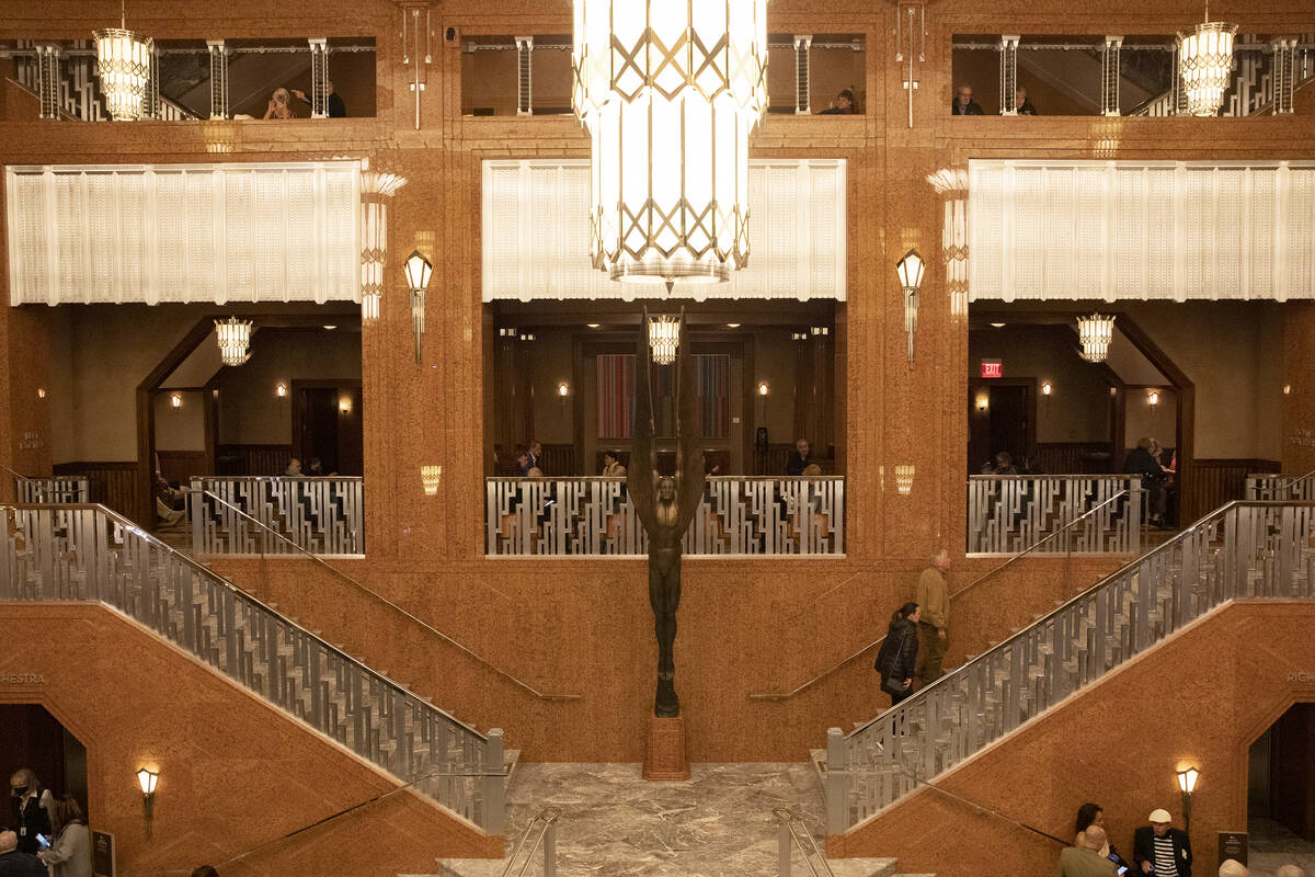 Attendees of the 10th anniversary celebration at The Smith Center for the Performing Arts roam ...