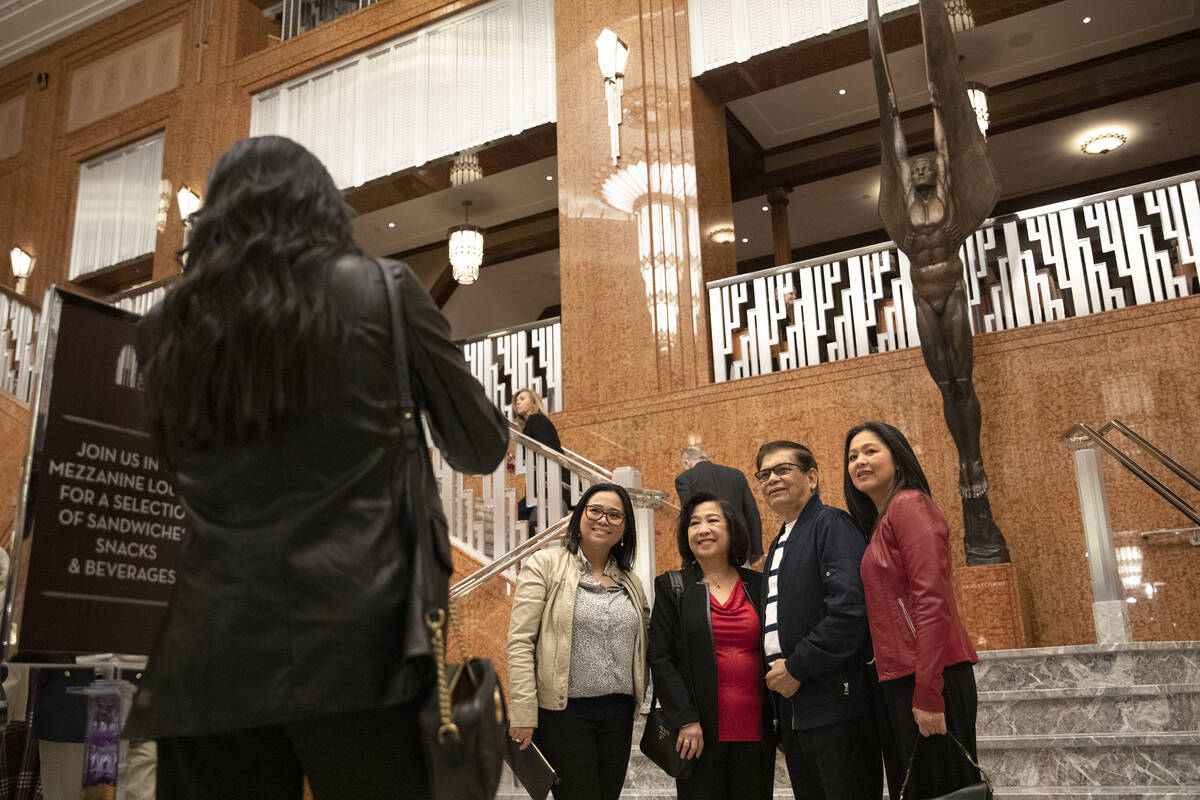 Attendees of the 10th anniversary celebration at The Smith Center for the Performing Arts take ...