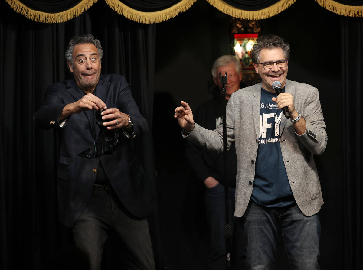Las Vegas Review-Journal columnist John Katsilometes, right, banters with Brad Garrett before G ...