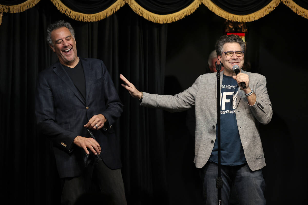 Las Vegas Review-Journal columnist John Katsilometes, right, banters with Brad Garrett before G ...