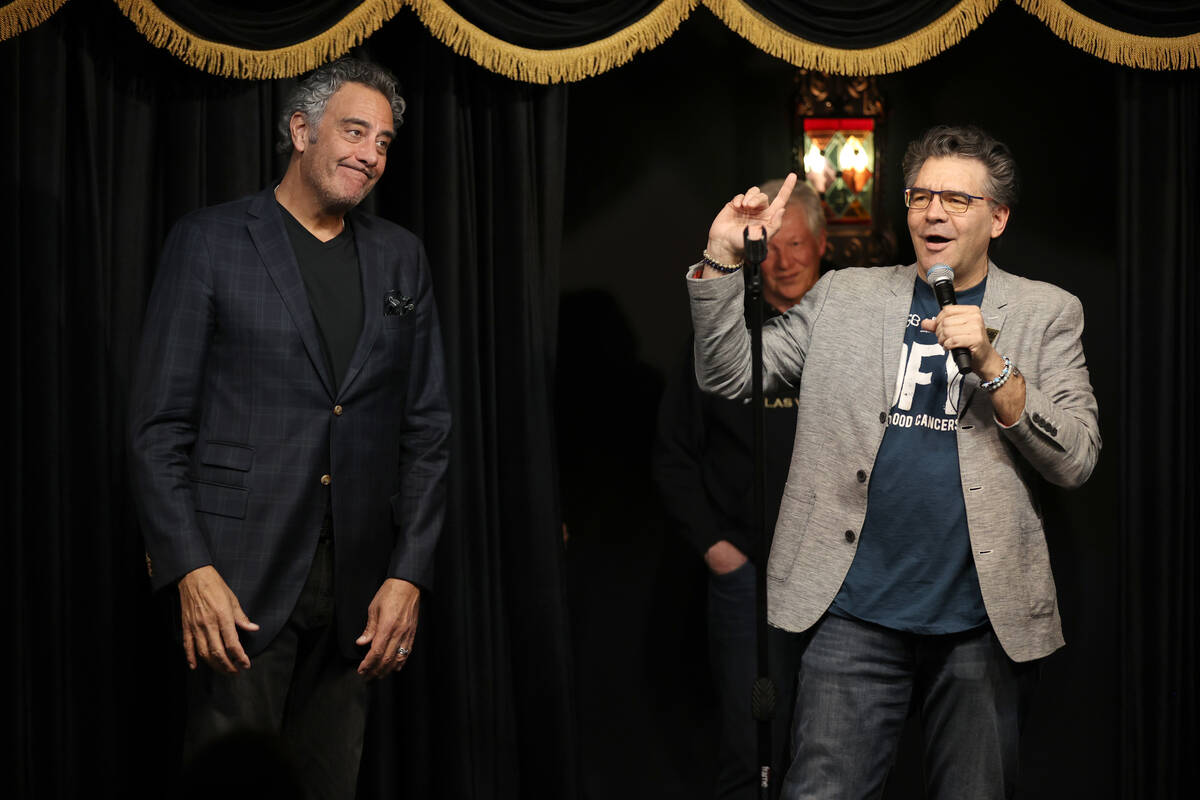 Las Vegas Review-Journal columnist John Katsilometes, right, banters with Brad Garrett before G ...