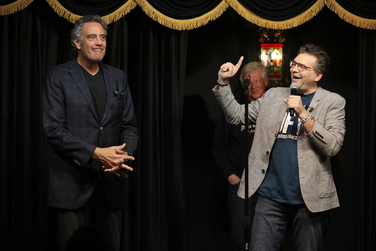 Las Vegas Review-Journal columnist John Katsilometes, right, banters with Brad Garrett before G ...