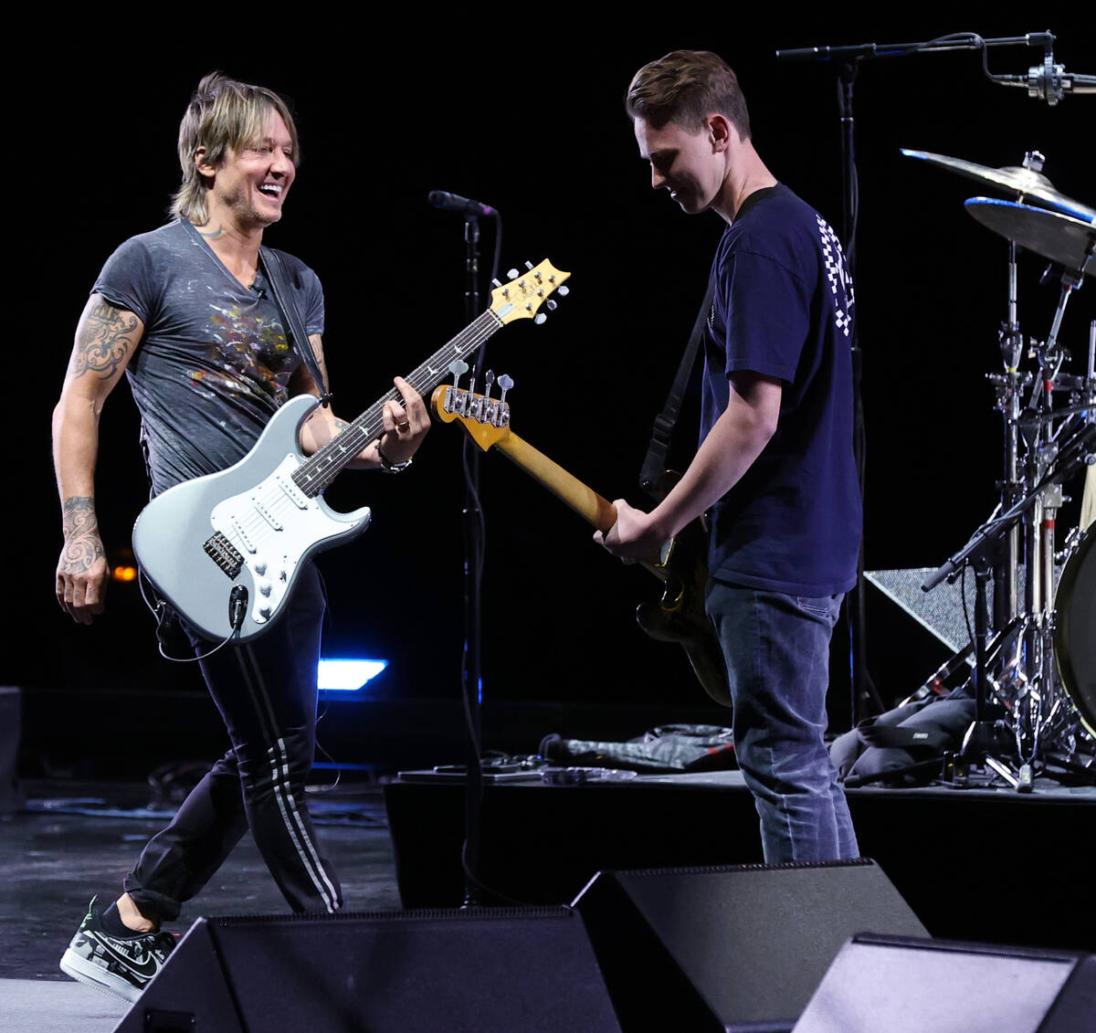 Caesars resident artist Keith Urban jams with Las Vegas Academy student Bradley Love at the Col ...