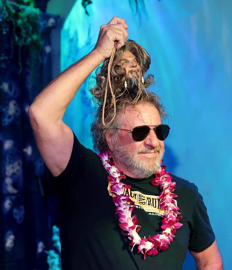 Sammy Hagar shows his shrunken head during an unveiling ceremony at The Golden Tiki in Las Vega ...