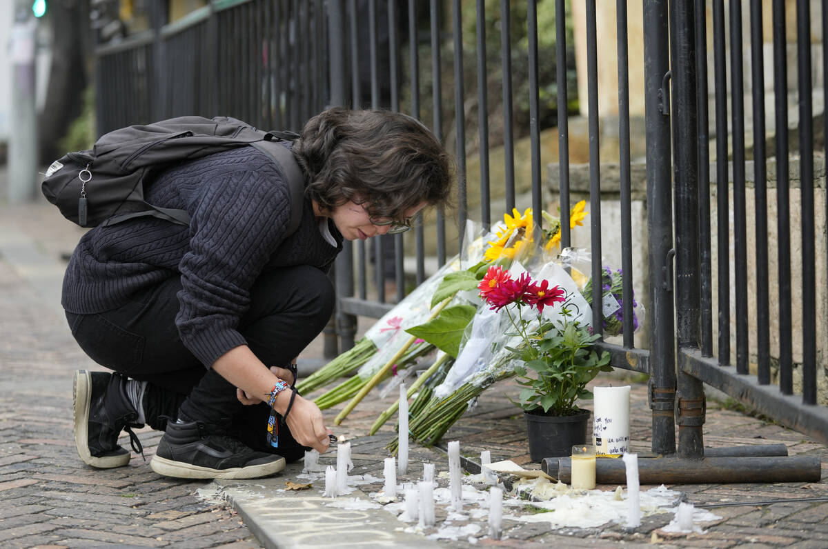 A fan of U.S. band Foo Fighters places lights in front of the hotel where the band's drummer Ta ...