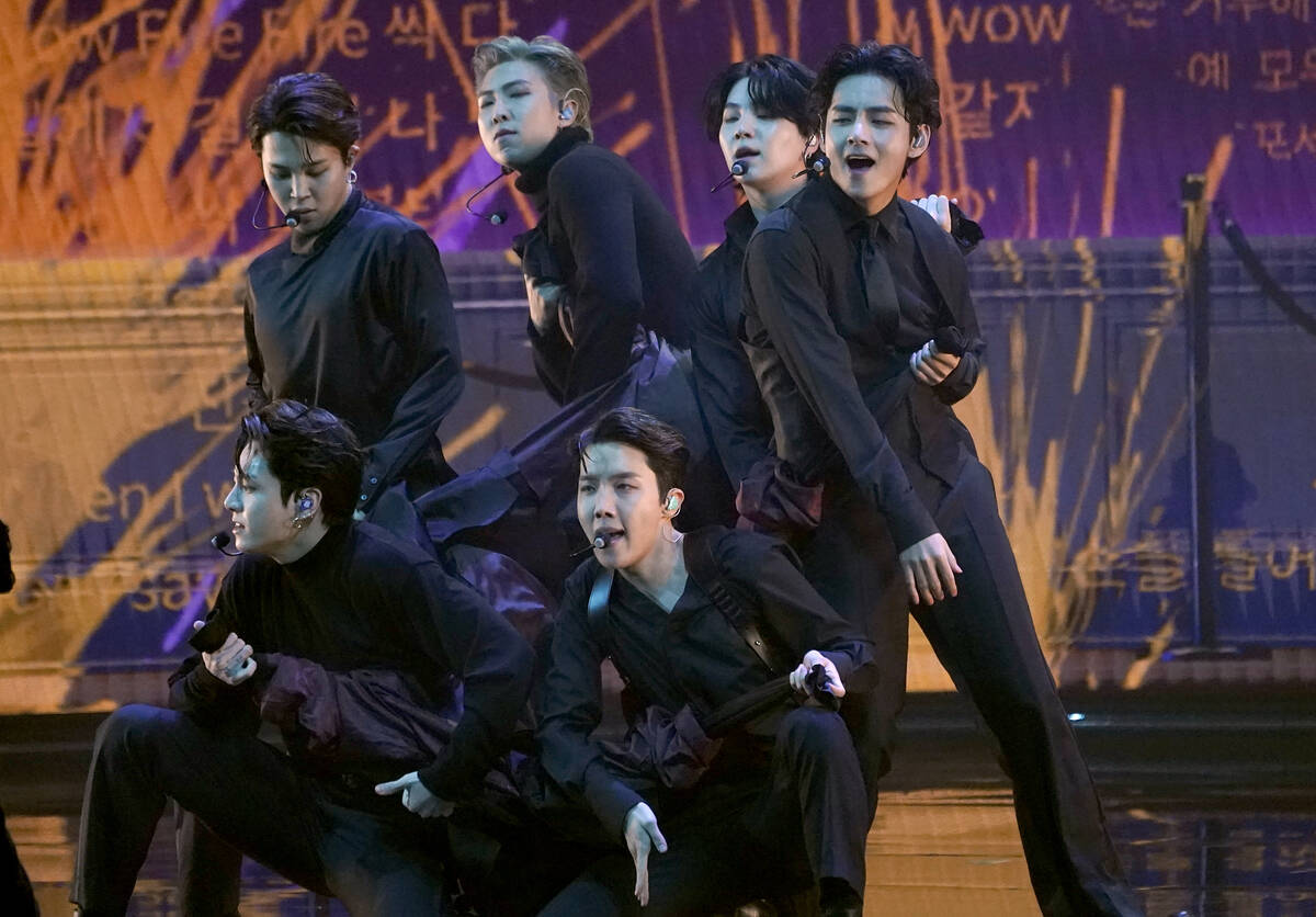 BTS performs "Butter" at the 64th Annual Grammy Awards on Sunday, April 3, 2022, in L ...