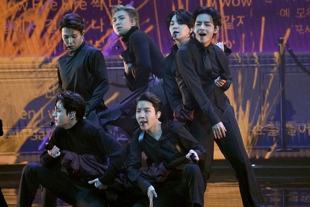 BTS performs "Butter" at the 64th Annual Grammy Awards on Sunday, April 3, 2022, in L ...