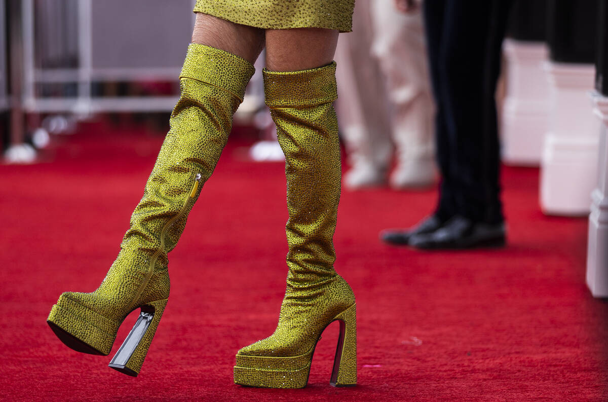 Donatella Versace, left, on the red carpet before the start of the 2022 Grammy Awards on Sunday ...