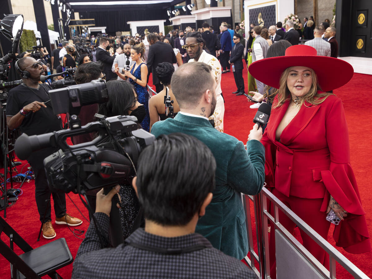 Elle King, right, on the red carpet before the start of the 2022 Grammy Awards on Sunday, April ...