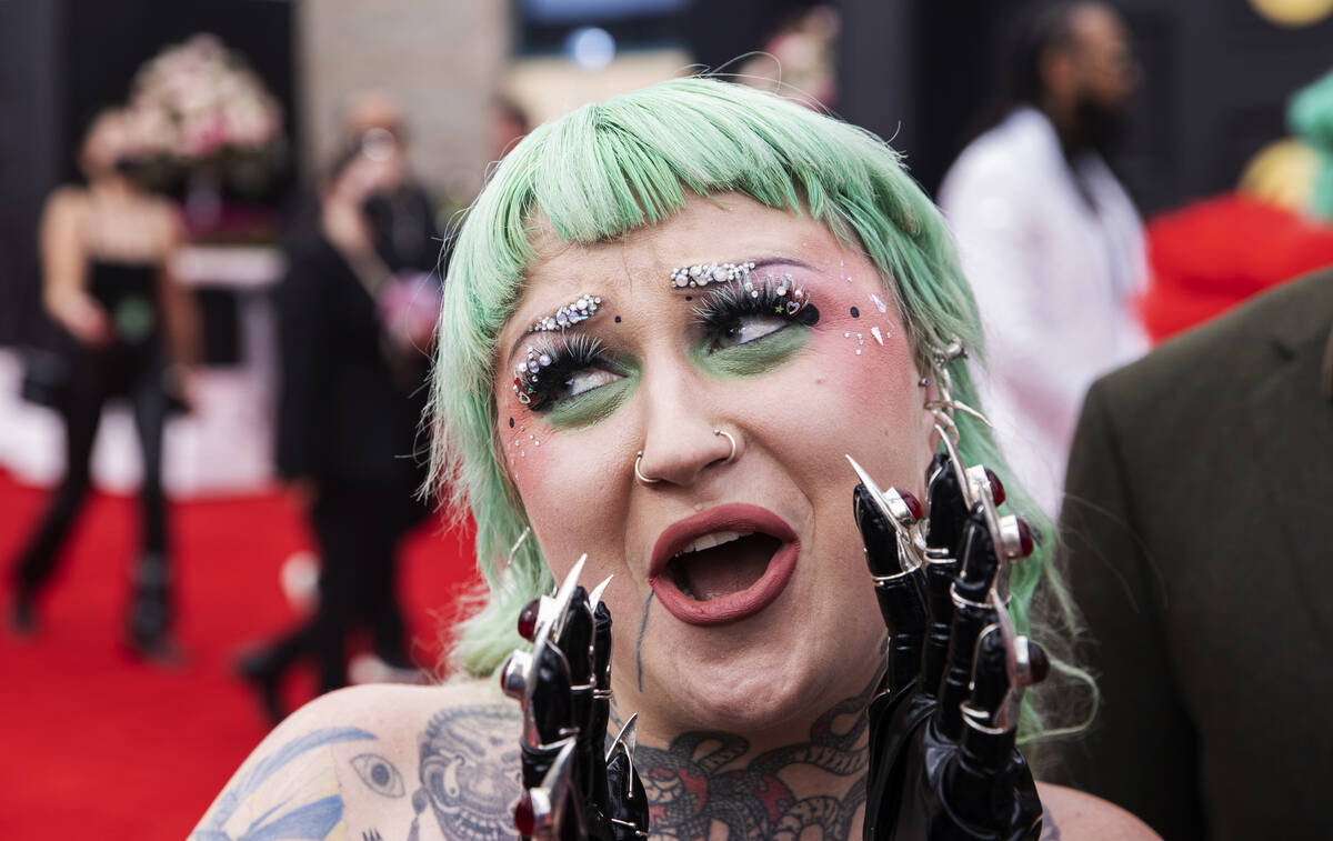 Nai Palm on the red carpet before the start of the 2022 Grammy Awards on Sunday, April 3, 2022, ...